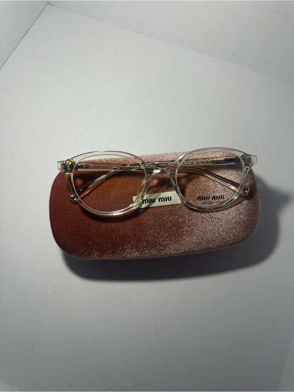 Miu Miu Clear Round Eyeglasses with Pink Velvet Case